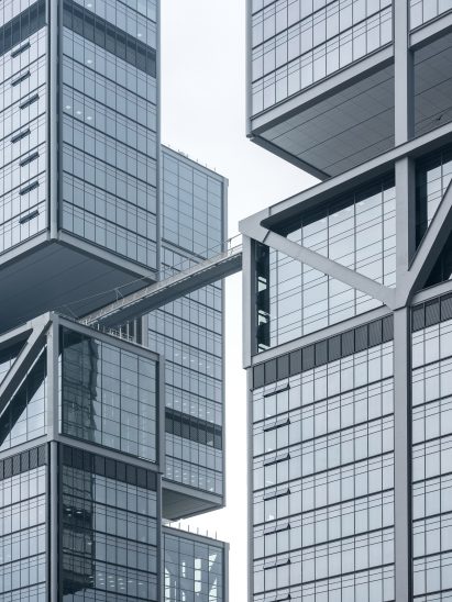 Detail image of the exterior of DJI Sky City and its suspension bridge