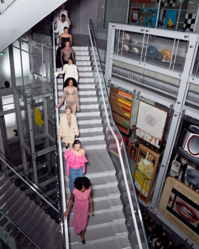 Image of Francon fashion models walking down the stairs of Depot Boijmans Van Beuningen