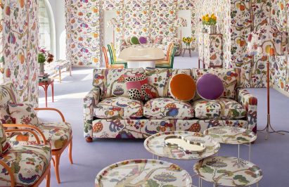 Photograph of an exhibition referencing a living room interior by India Mahdavi