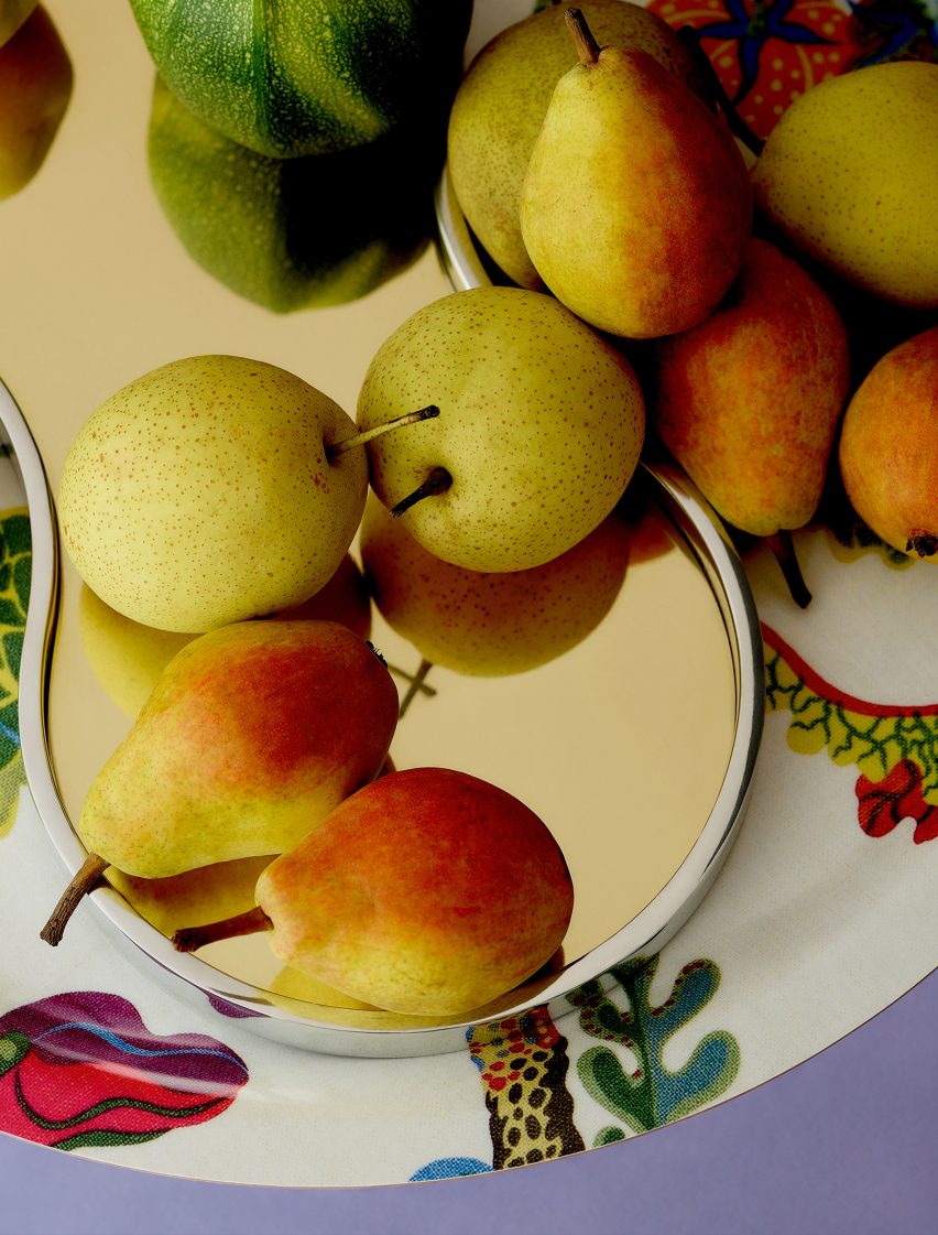 Pewter tray with apples on it