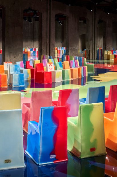 Image of the back of the resin chairs at the Geatano Pesce-designed set at Bottega Veneta Spring Summer 2023