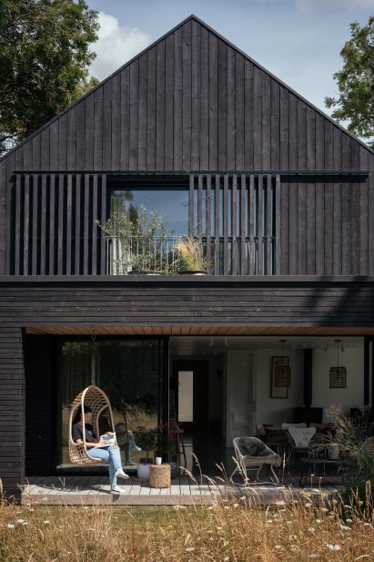 Black timber-clad exterior of house by HAPA Architects