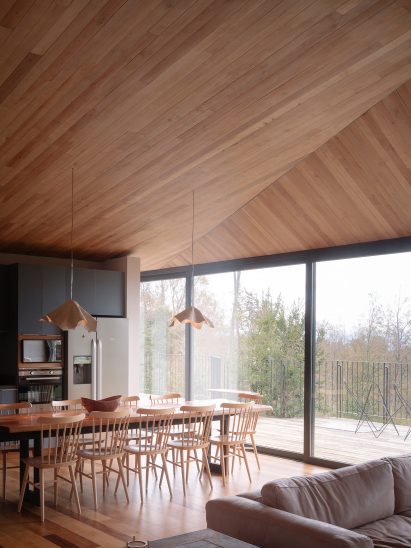 Vaulted oak ceiling in kitchen, living, and dining area