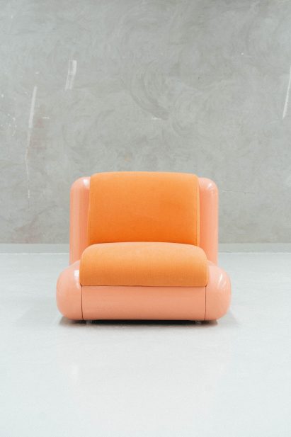 A blush pink seat called T4