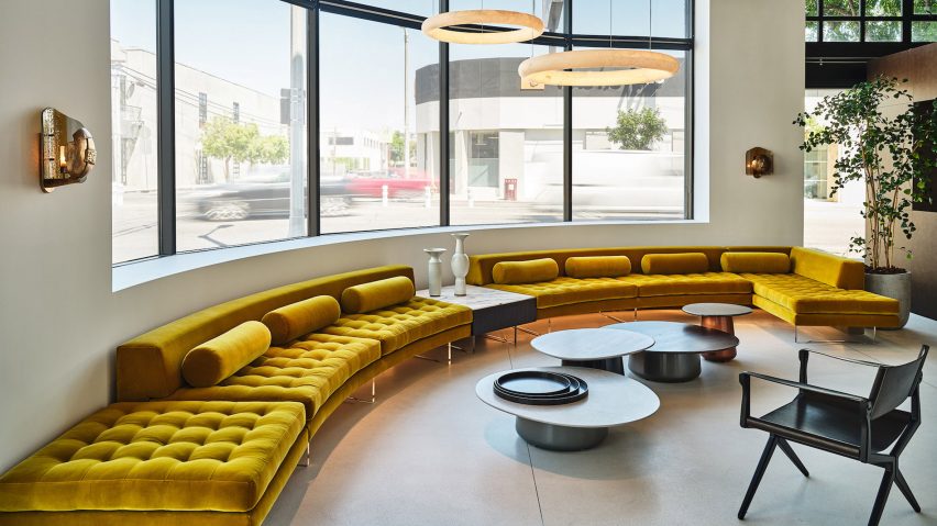 Mustard yellow sofa at Holly Hunt showroom