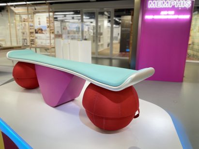 Photograph showing piece of furniture with seat and geometric shapes for legs