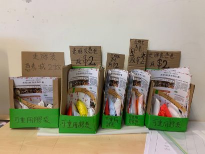 Cardboard boxes with pamphlets in on a table