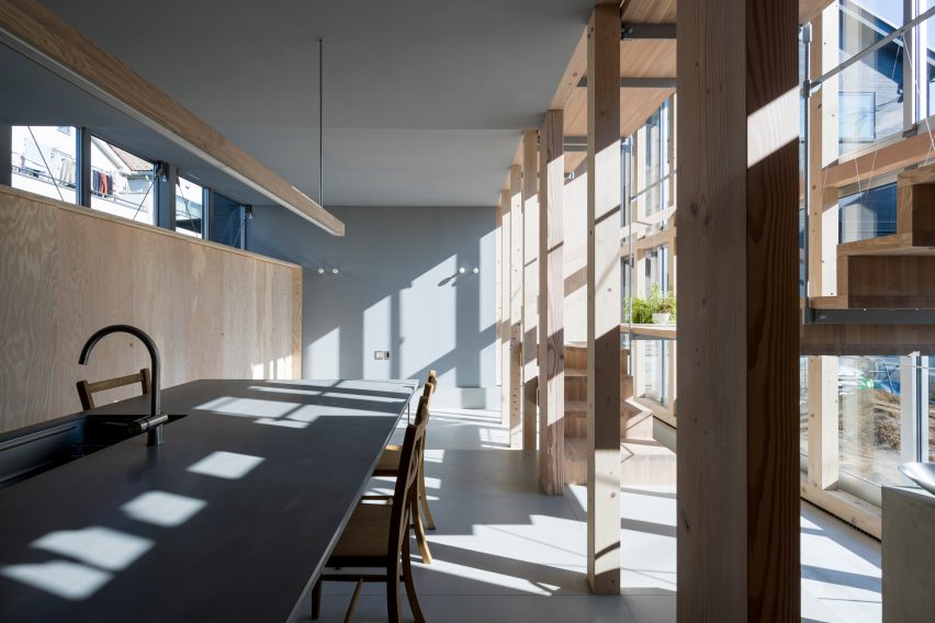Kitchen and dining room, Light-Filled Stair Hall by Kiri Architects