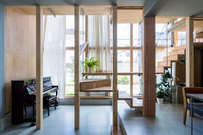 Timber structural columns, Light-Filled Stair Hall by Kiri Architects
