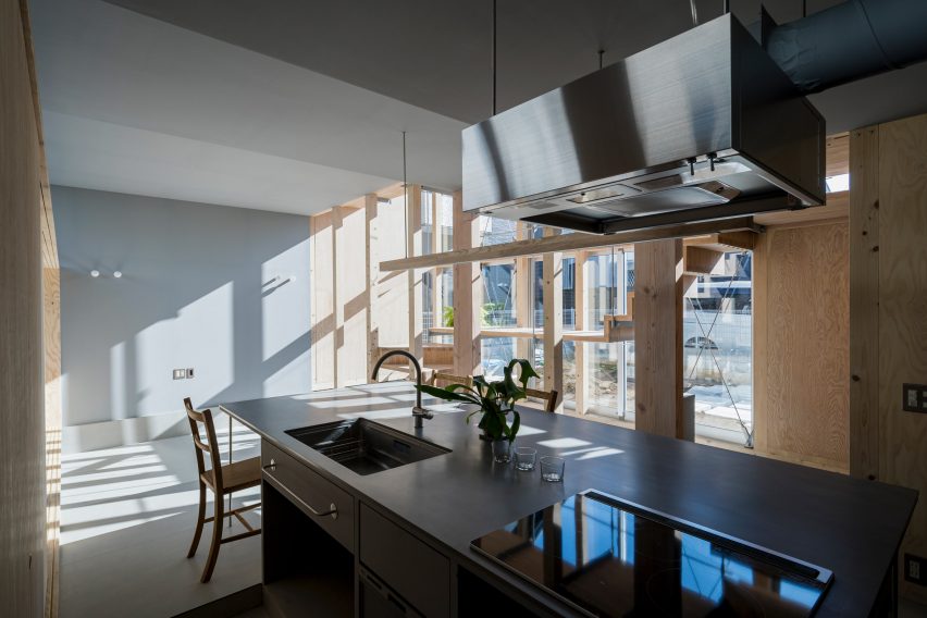 Kitchen, Light-Filled Stair Hall by Kiri Architects