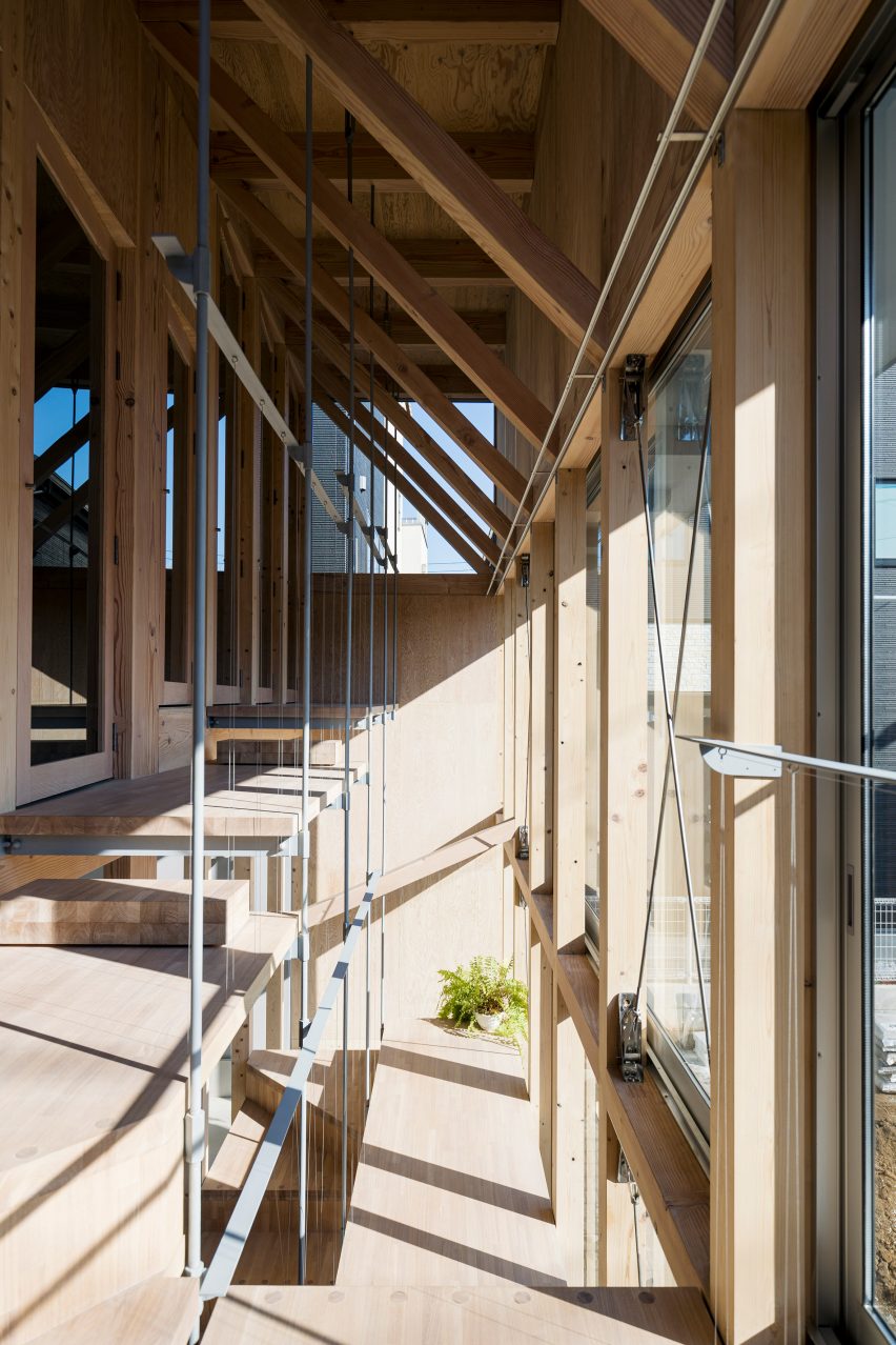 Upper level of the staircase, Light-Filled Stair Hall by Kiri Architects