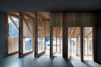 Bedroom space with six glazed doors