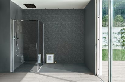 Photograph showing shower enclosure with botanical print tiles
