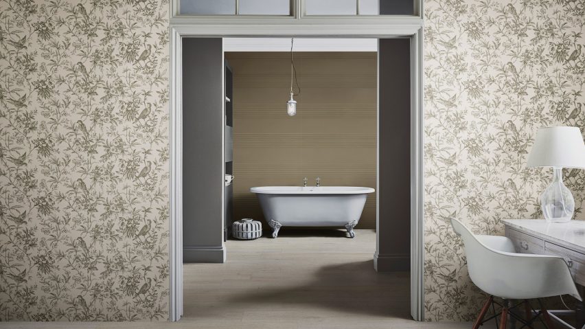 Photograph showing bath area with botanical print tiles