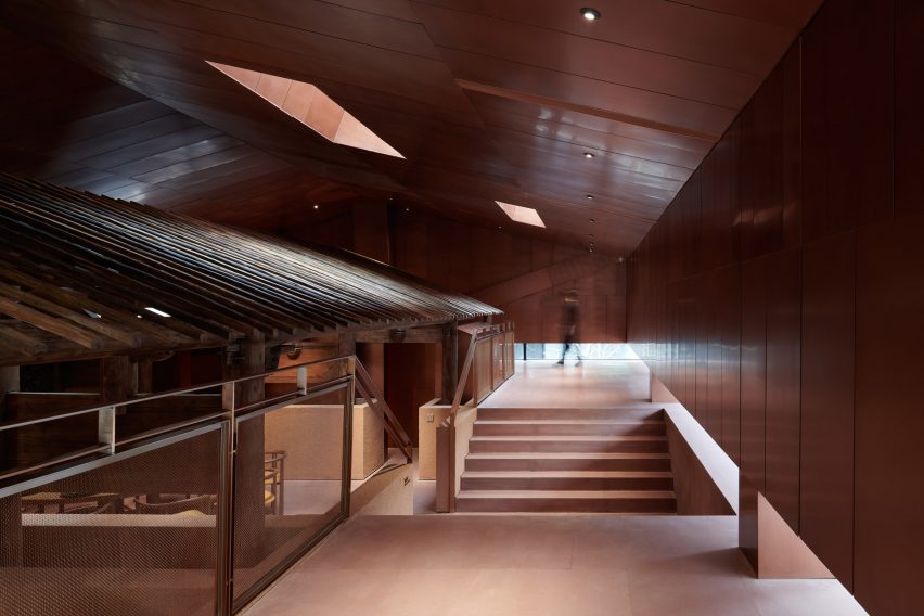 Neri&Hu incorporates historic wooden structure into copper-clad tea rooms