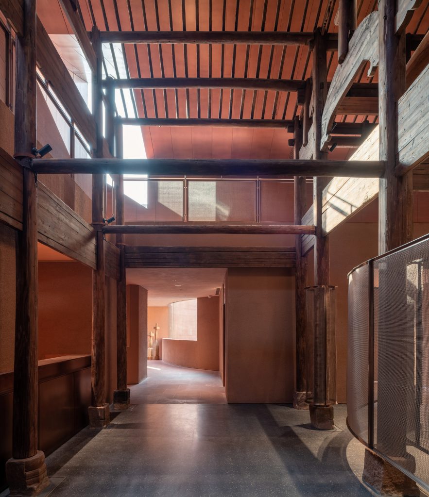 Neri&Hu incorporates historic wooden structure into copper-clad tea rooms