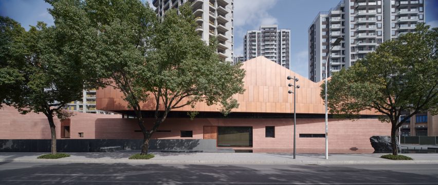 Neri&Hu incorporates historic wooden structure into copper-clad tea rooms