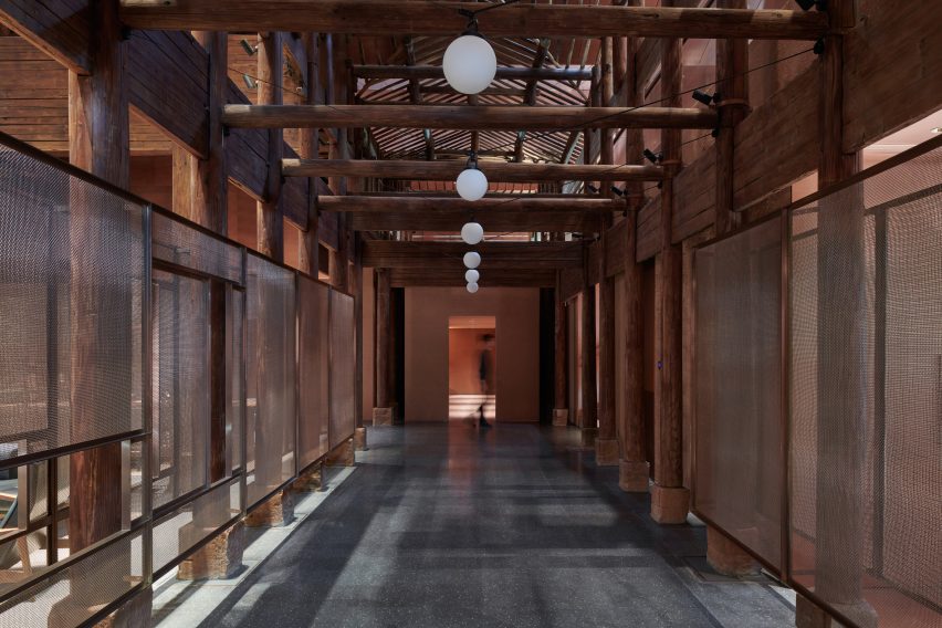 Neri&Hu incorporates historic wooden structure into copper-clad tea rooms