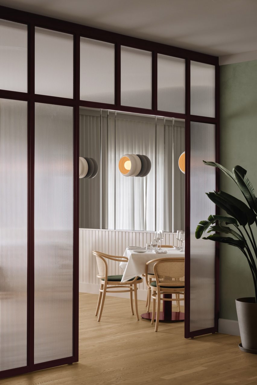 Fritted glass dividing wall
