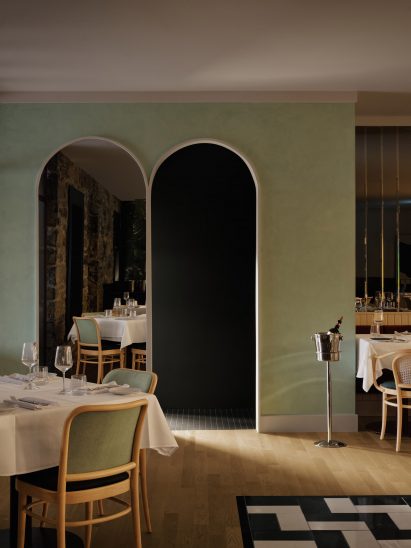 Two arches in pistachio-coloured wall