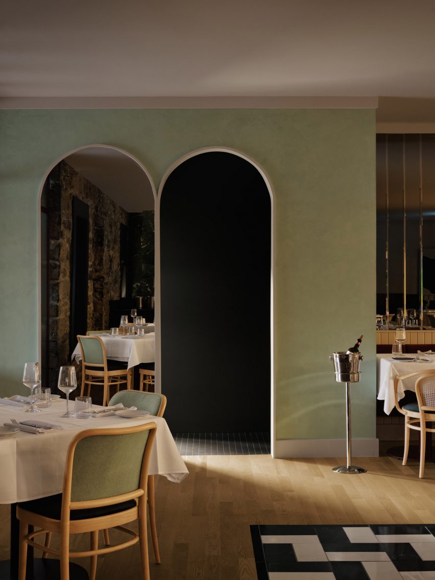 Two arches in pistachio-coloured wall