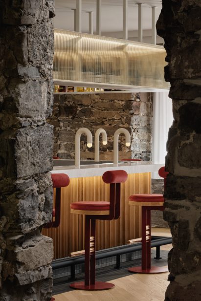 Custom lighting and stools at the bar