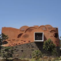 Exterior image of Gadi House and its waved brick facade
