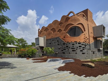 Exterior image of Gadi House and its paved gardens