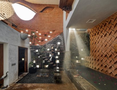Interior image of a courtyard within the exterior brick walls of Gadi House