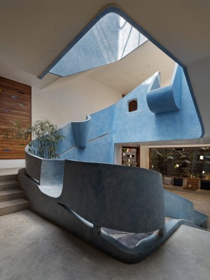 Interior image of a sculptural staircase at Gadi House