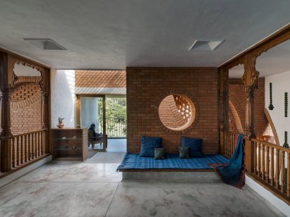 Interior image of a living area in the brick-lined home