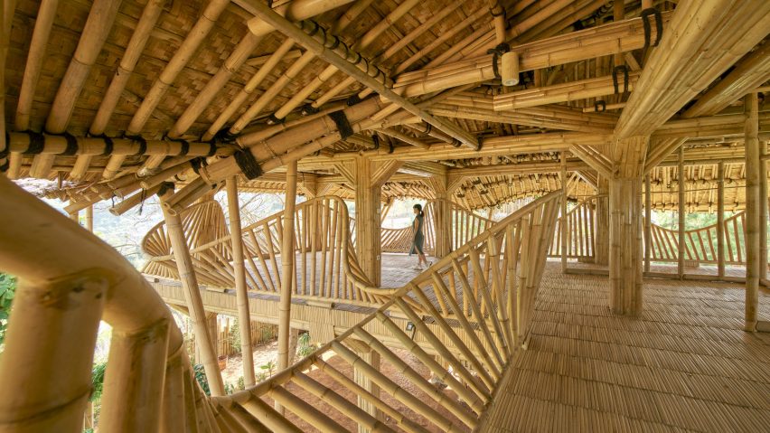 Interior image of a bamboo-lined community space at Piyandeling Artisan House