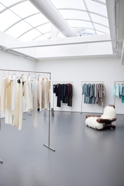Interior image of Róhe Frames clothing on clothes rails