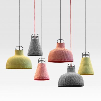 Photograph of grey, green and pink pendant lamps