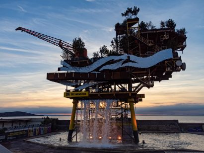 The See Monster art installation sits on a beach