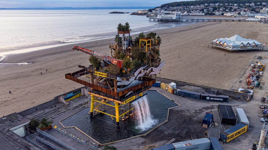An old gas platform with yellow legs and planted garden