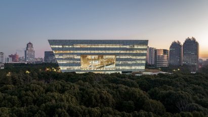 Library in a park with glass facade