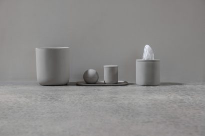 Grey bathroom storage items by Kim Kardashian