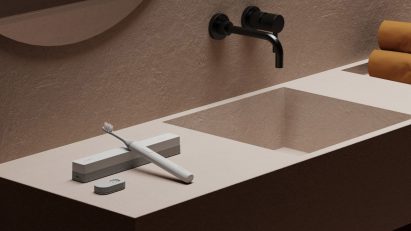 A Suri toothbrush on a sink