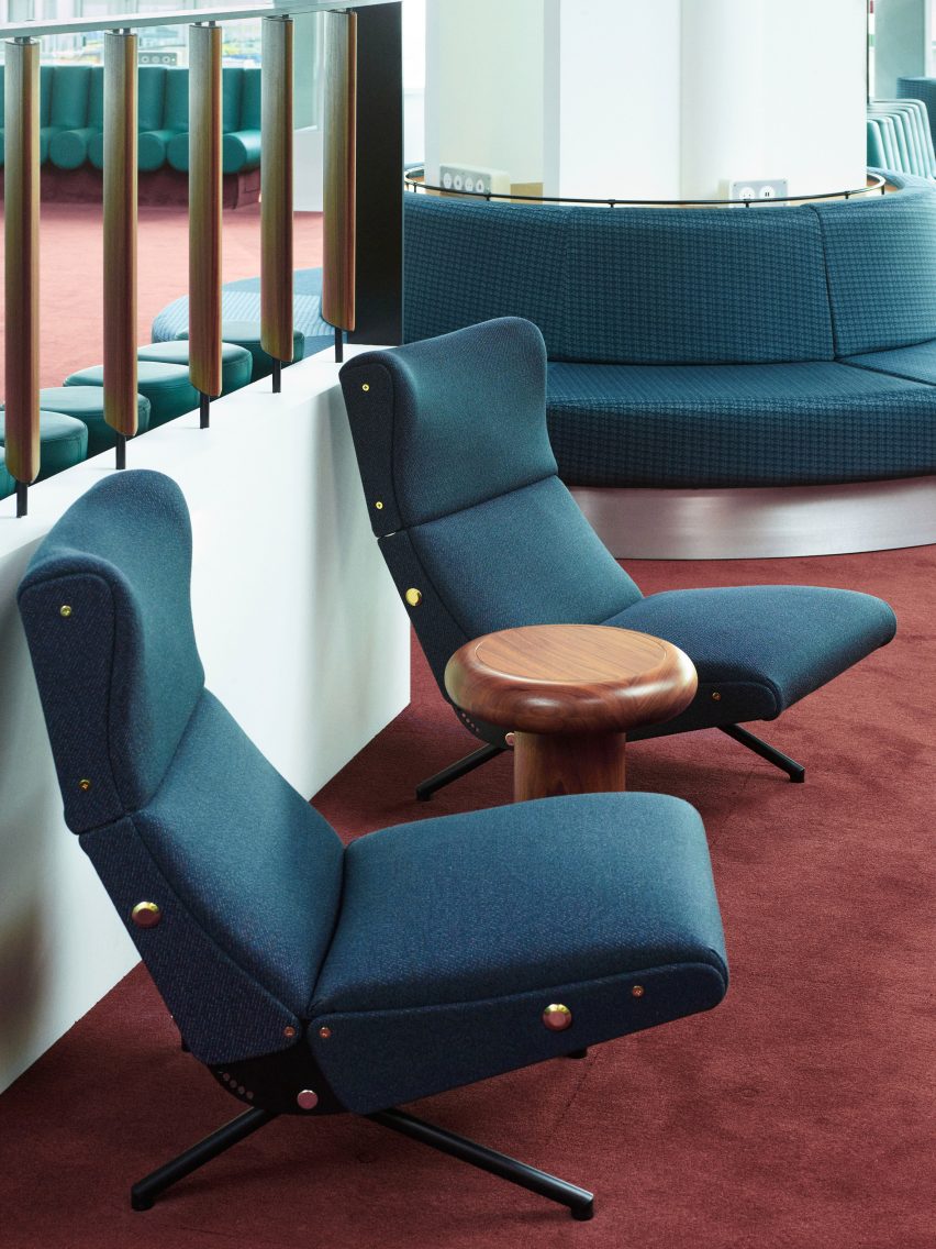Photograph showing airport departure lounge with green seating