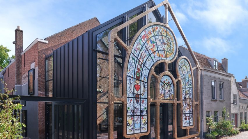 Former church with modern exterior stained-glass window