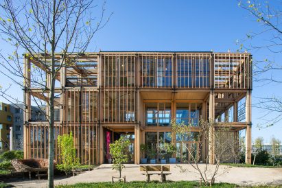 Exterior image of The Natural Pavilion surrounded by plants