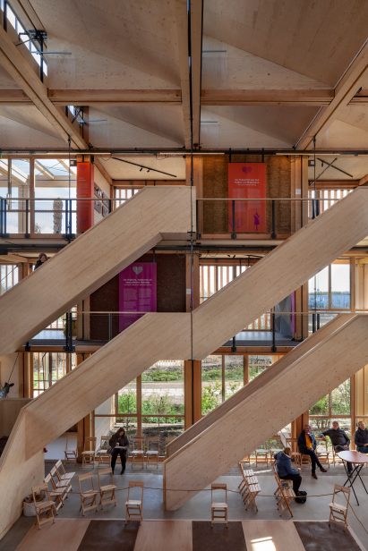 Interior image of The Natural Pavilion and its wooden staircases