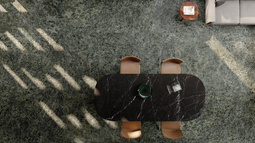Aerial view showing dining chairs and table on marble patterned flooring