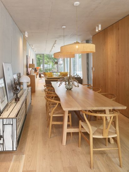 Wooden dining table in wood-panelled room