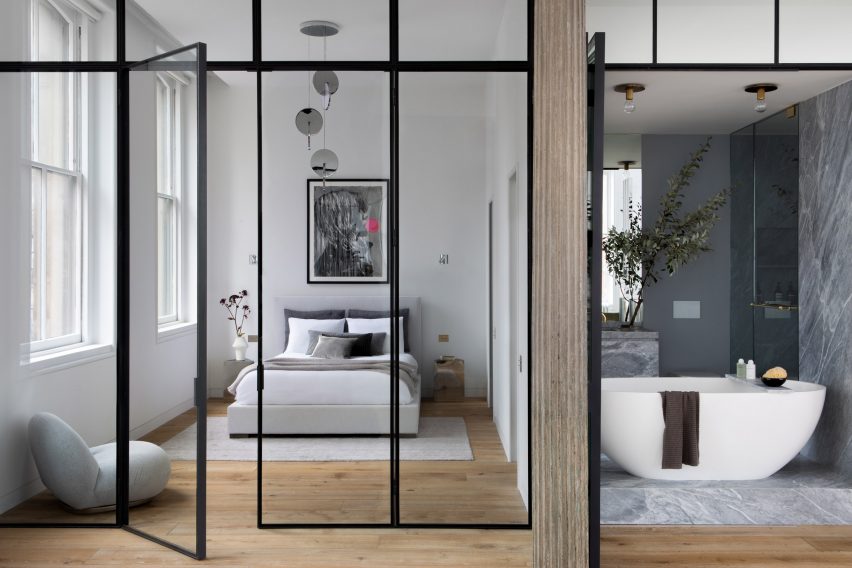 Bedroom and bathroom behind open panels