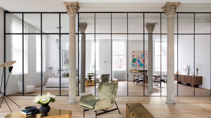 Living room with partially mirrored wall