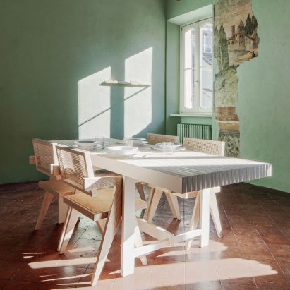 A home with an unfinished interior and green walls