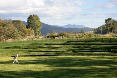 Benches in grassy amphitheatre by Z'scape in China