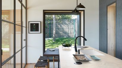 A kitchen featuring Corian Solid Surface counters